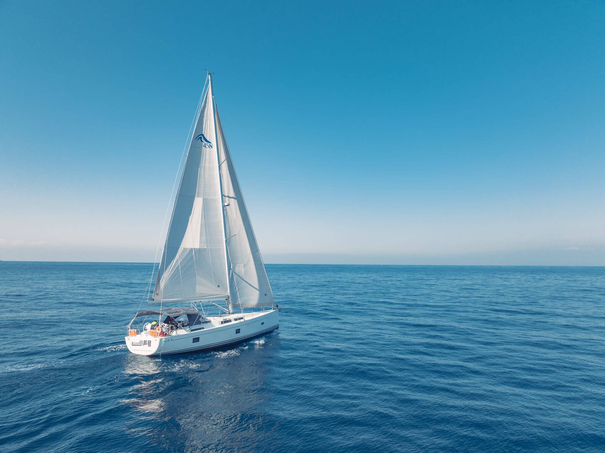 A recently financed Hanse Sailing Yacht heads out to sea